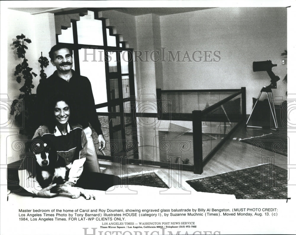 1964 Carol and Roy Doumani show off the master bedroom. - Historic Images