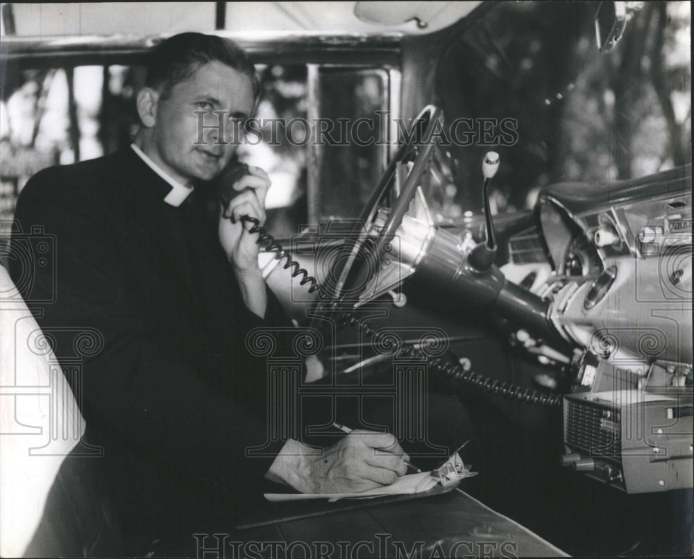1961 Rev. Paul F.W. Pieper with his mobile radio unit. - Historic Images