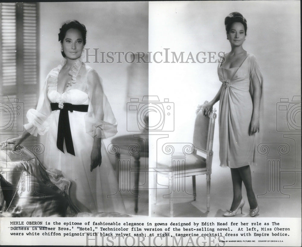 1969 Merle Oberon in her fashionable elegance in his gown - Historic Images