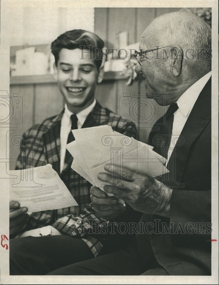 1960 Searle Whitney with Doctor George White Reading Letters - Historic Images