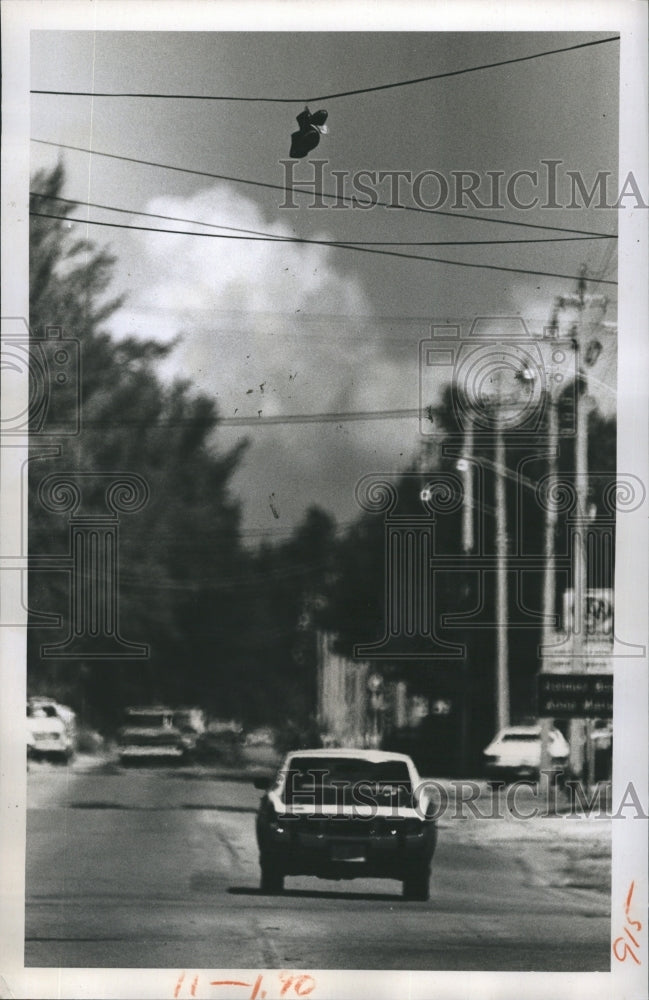 Press Photo Shoes on telephone pole. - Historic Images