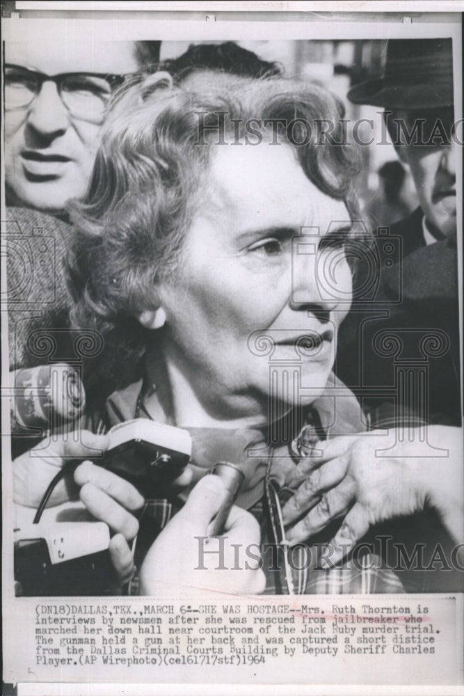 1964 Mrs. Ruth Thornton interviewed by newsmen - Historic Images