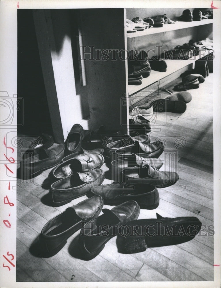 1969 Shoes in closet as teen go to a dance - Historic Images