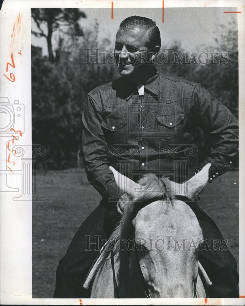 1974 Dr Richard Trump on horseback - Historic Images