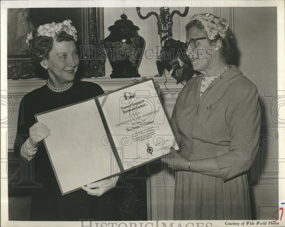 1959 Mamie woman presenting certificate of membership - Historic Images