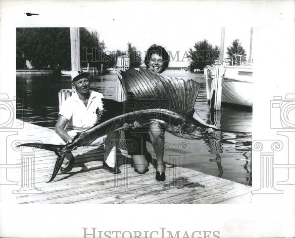 1961 Mrs. John Steils catches a Sailfish. - Historic Images