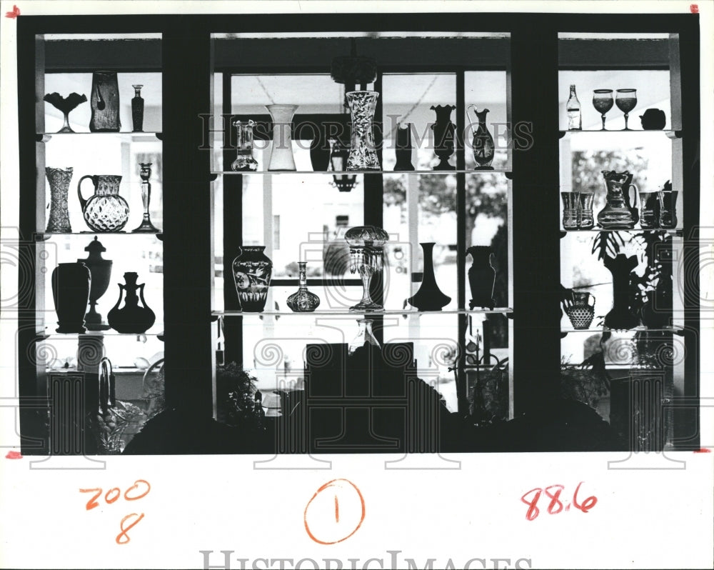 1980 Antique Glassware Graces The Entrance Of Largo Funeral Home - Historic Images