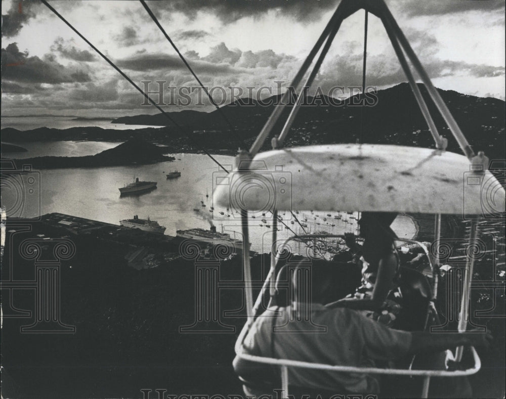 1975 Tourist enjoying cable car ride on St Thomas, Virgin Islands - Historic Images