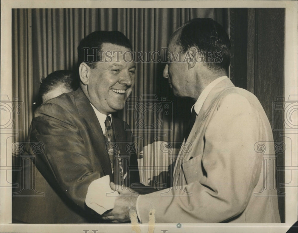 1952 hand shake from Frank McKinney Chariman Democratic National - Historic Images