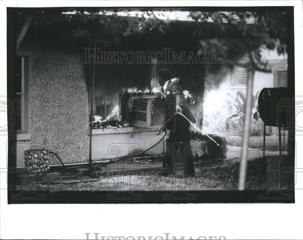 1989 Press Photo Fire damages house John Stonom - Historic Images