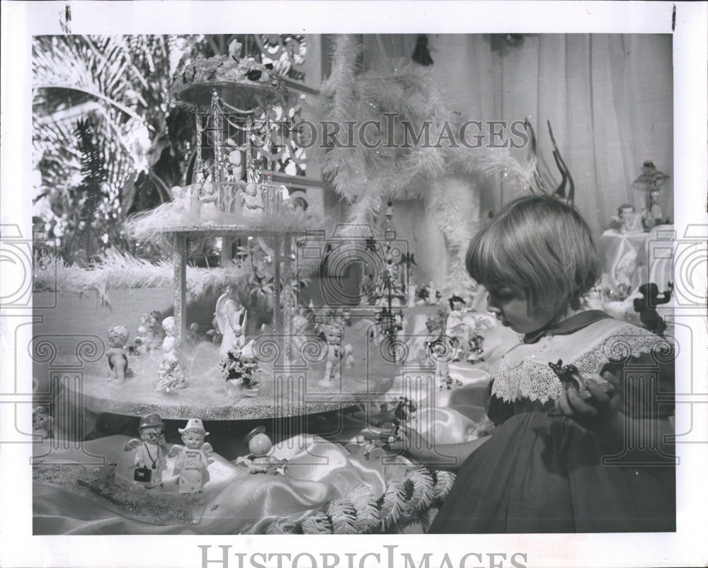 1962 Weslyn Baird, daughter of The Willard Bairds, in angel land - Historic Images