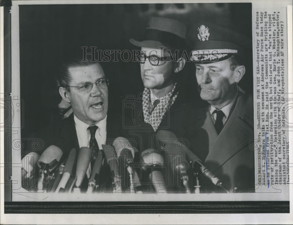 1965 US Sec of Defense Robert S McNamara,and newsmen - Historic Images