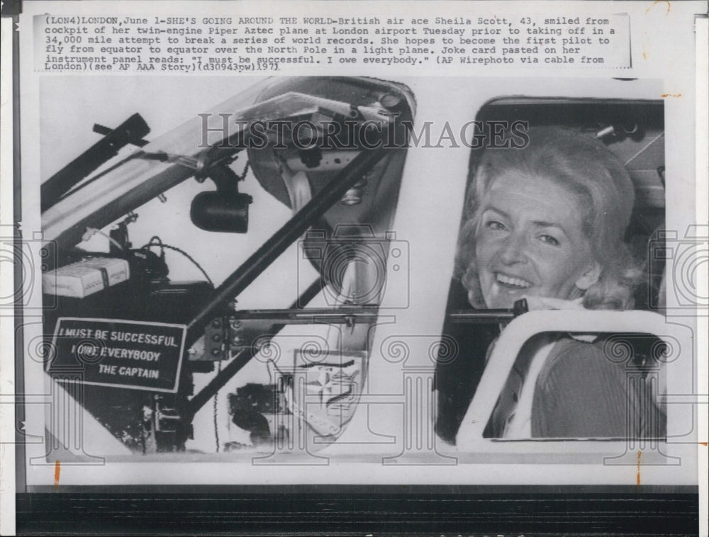 1973 Press Photo Sheila Scott British air ace,smiled of her cockpit twin-engine. - Historic Images