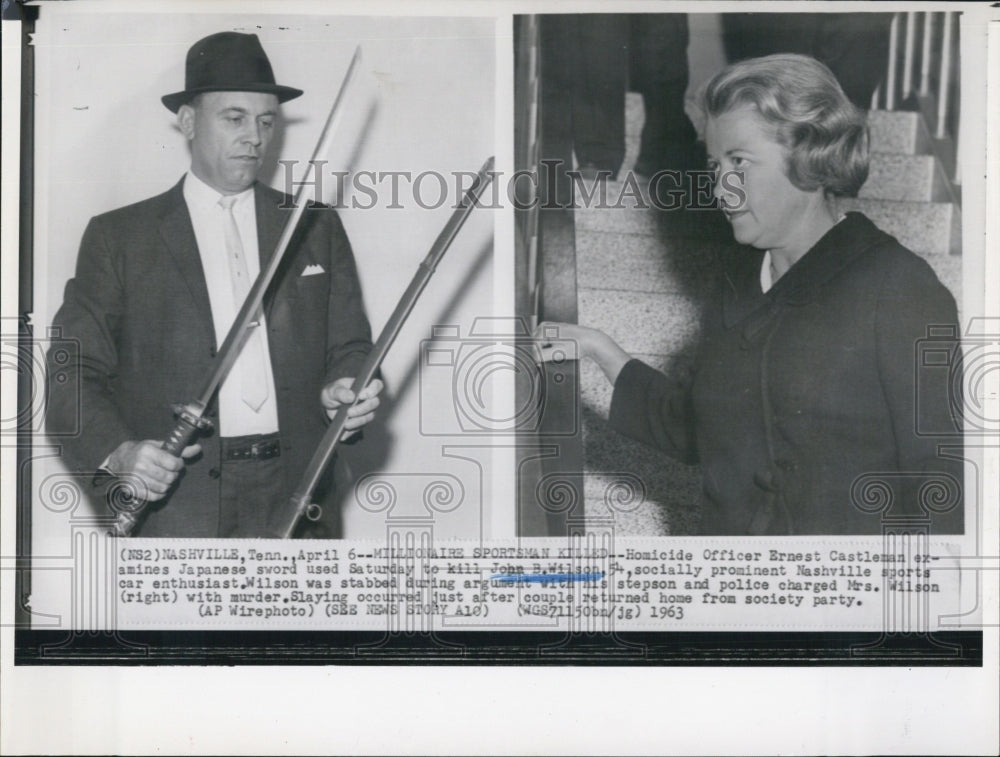 1963 Press Photo Officer Ernest Castleman holds sword used to kill John B Wilson - Historic Images