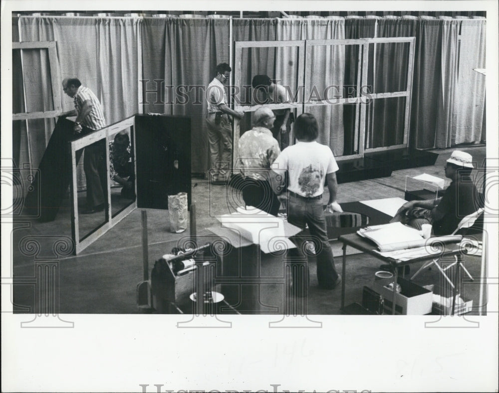 1977 Press Photo Area industries were busy today setting up Exhibit for Expo 77 - Historic Images