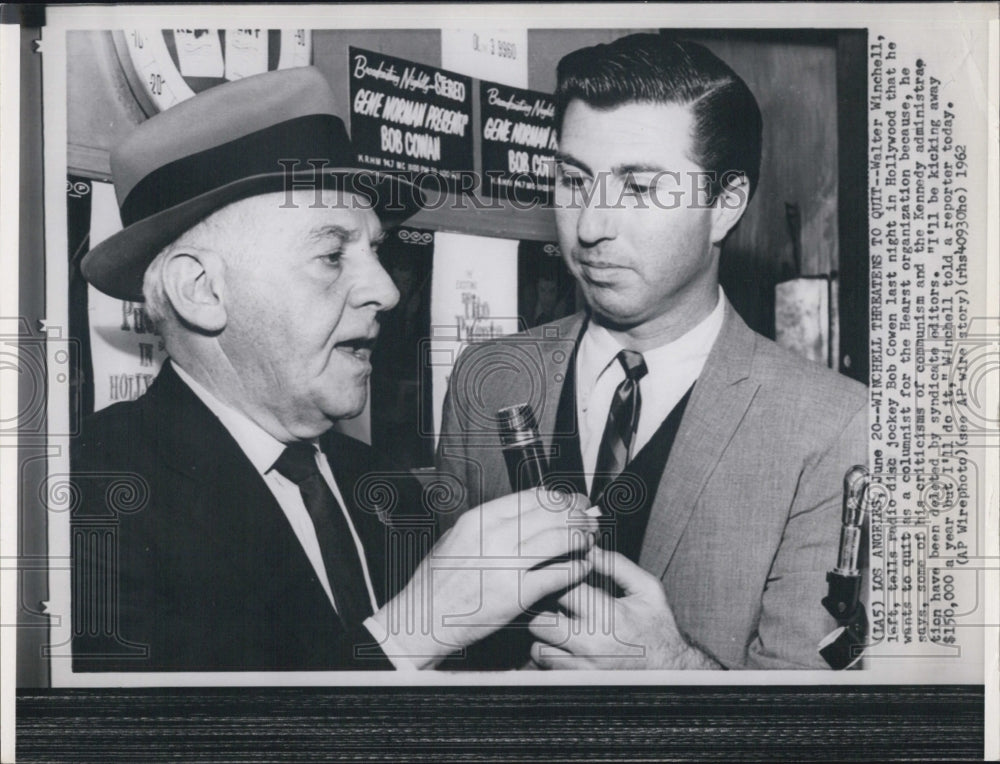 1962 Commentator Walter Winchell talks to Bob Cowen.  - Historic Images