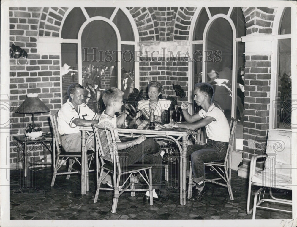 1952 Mr. and Mrs McDonald and their sons on their living room porch.-Historic Images