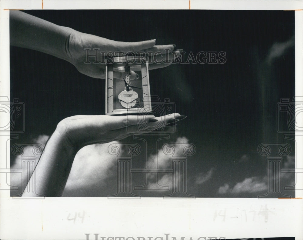 Press Photo Square cut glass enclosed clock - RSJ01637 - Historic Images
