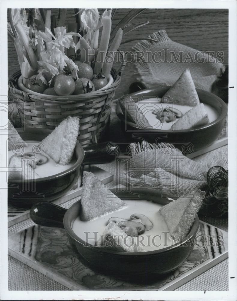 1979 Italian fondue served with bread dippers.-Historic Images