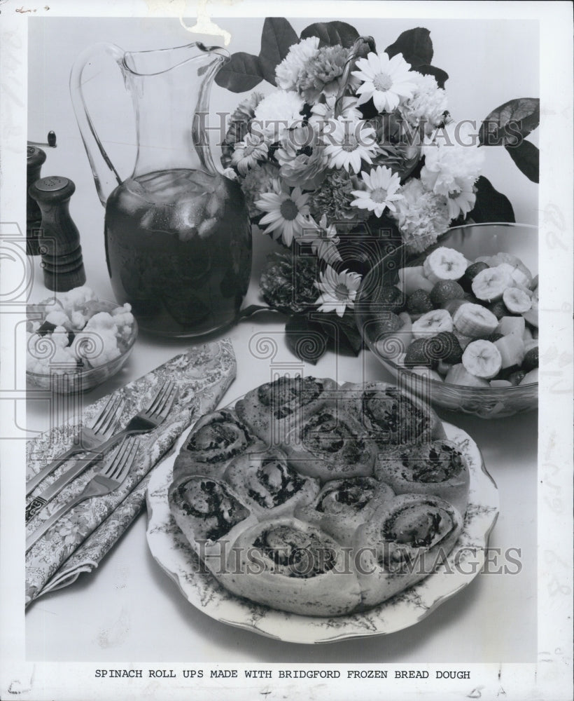 1977 Spinach roll-ups made with frozen dough.-Historic Images