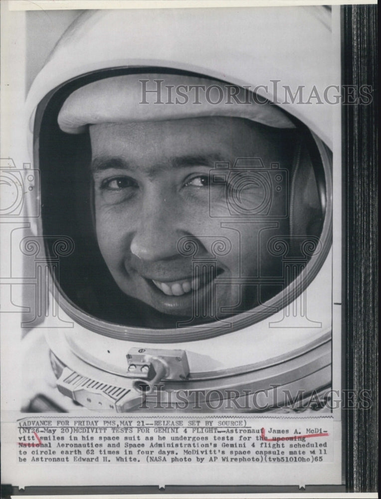 1965 Press Photo Astronaut James A. McDivitt testing for Gemini 4 flight - Historic Images