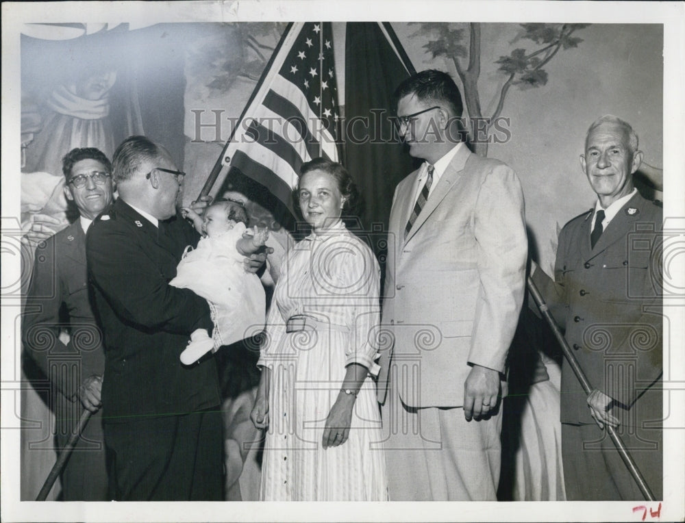 1958 Baby Marianne Marks being held by Col H Stout - Historic Images