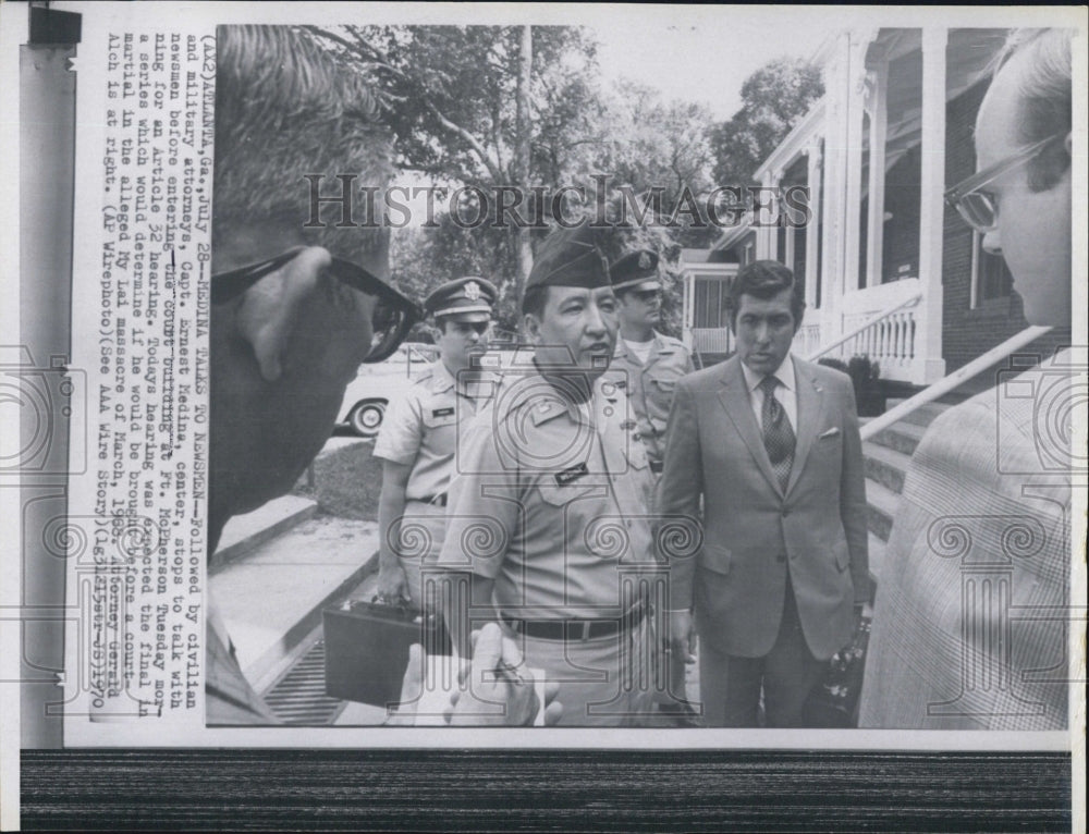 1970 Press Photo Capt.Ernet Medina(C)stops to talk with newsmen - RSJ13971 - Historic Images