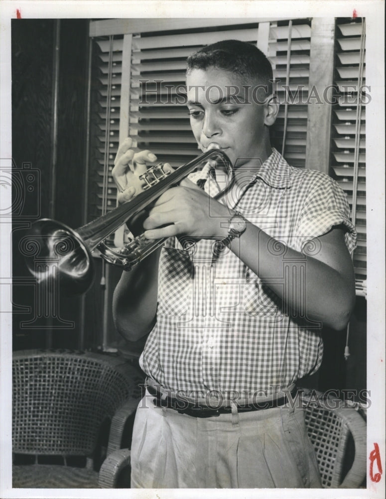 Press Photo Kid playing saxophone. - Historic Images