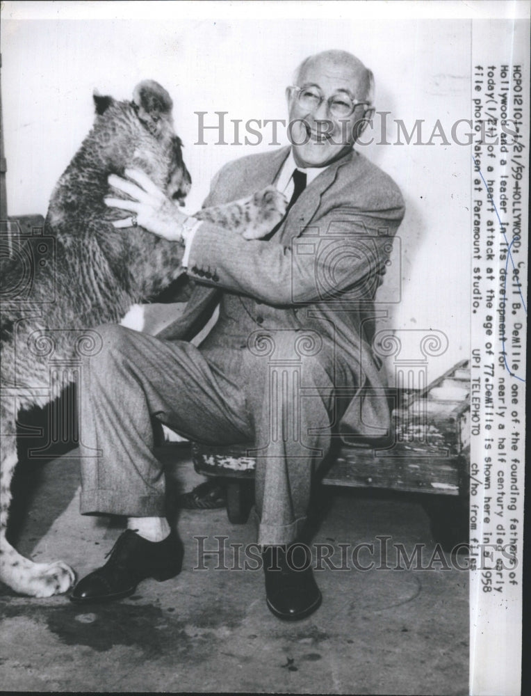 1959 Press Photo Hollywood Founder Cecil B. DeMille with a dog - Historic Images