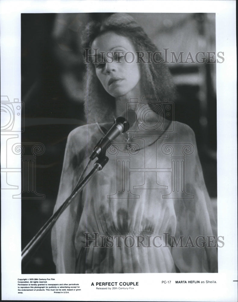 1979 Marta Heflin in a scene from the movie "A Perfect Couple" - Historic Images