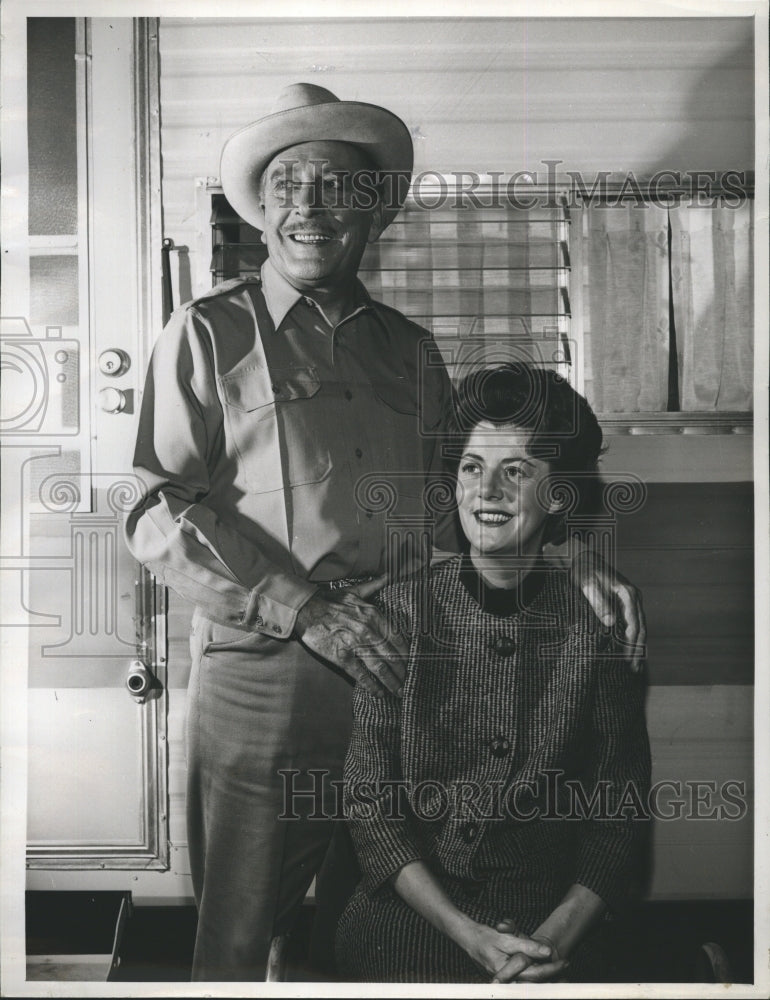 1963 Press Photo A picture of a man and a Lady(seated) - Historic Images