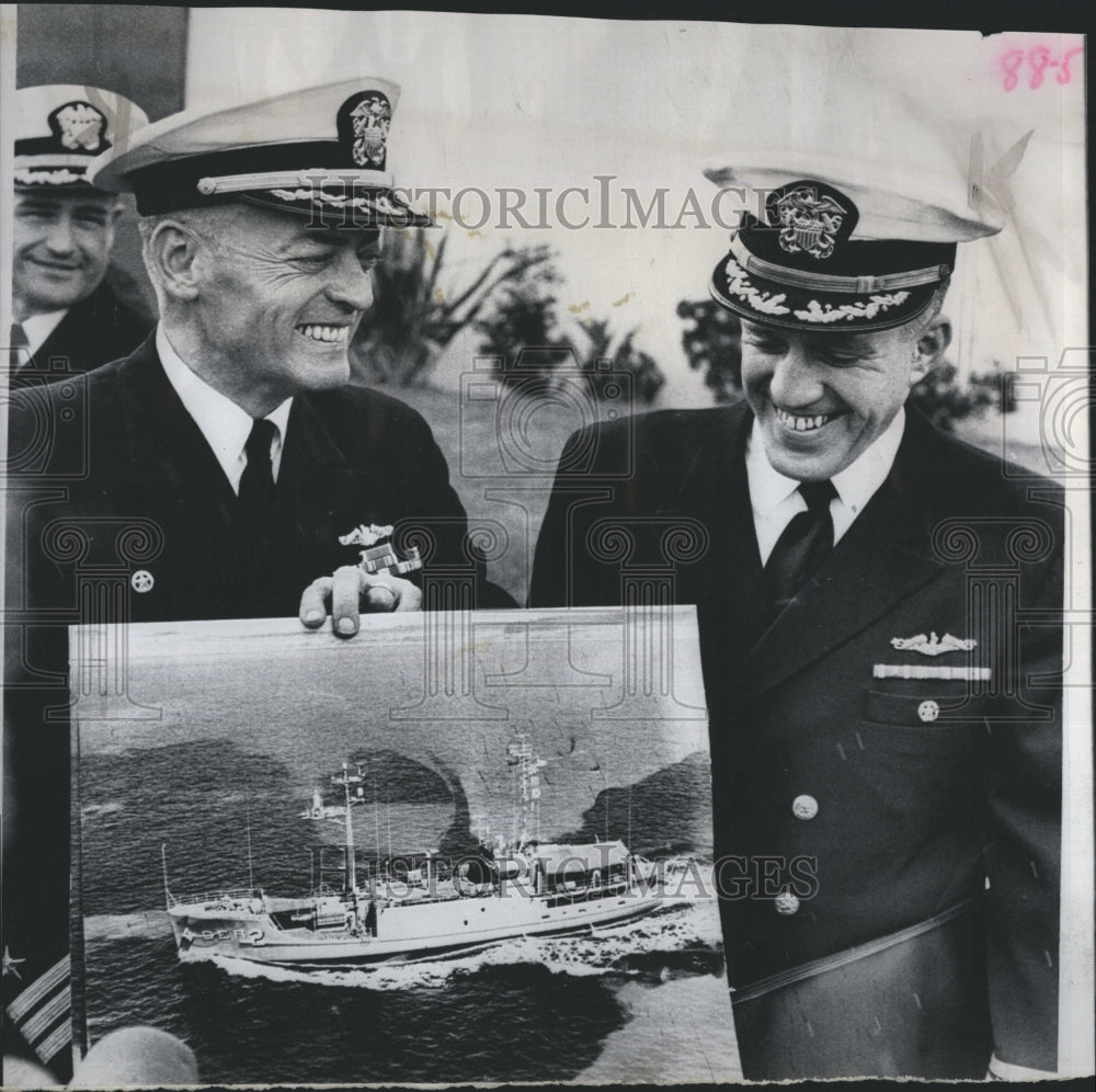 1969 Press Photo Lloyd Bucher and Peter Block With Photos of the USS Peublo - Historic Images