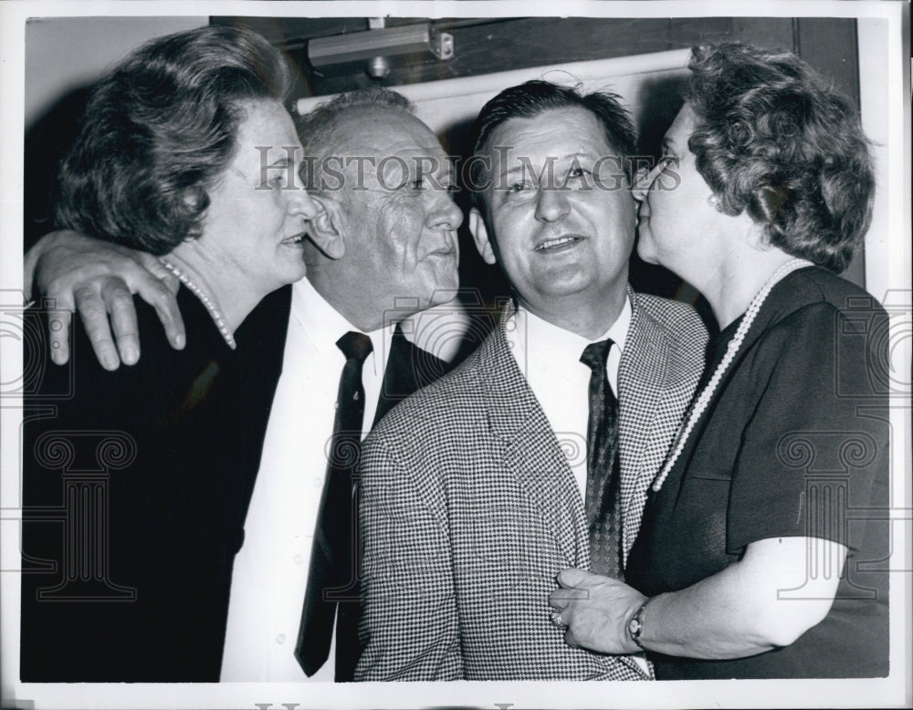 1964 Press Photo Mrs. Sophie Babics looks on while husband Stephen gets kisses - Historic Images