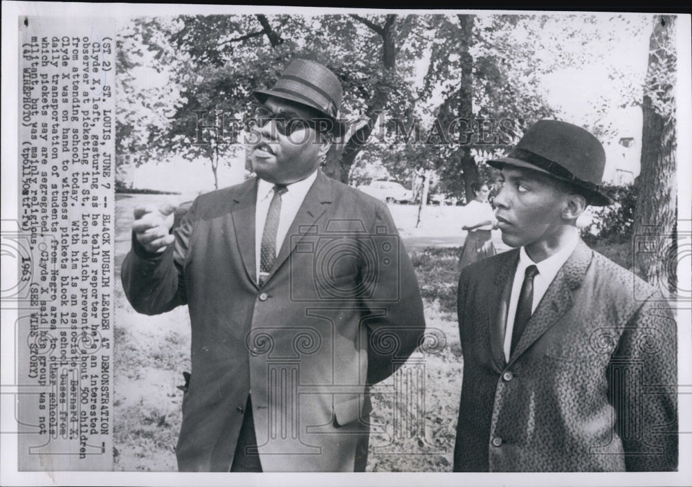 1963 Clyde X Observes Picketing That Prevents Children From School - Historic Images