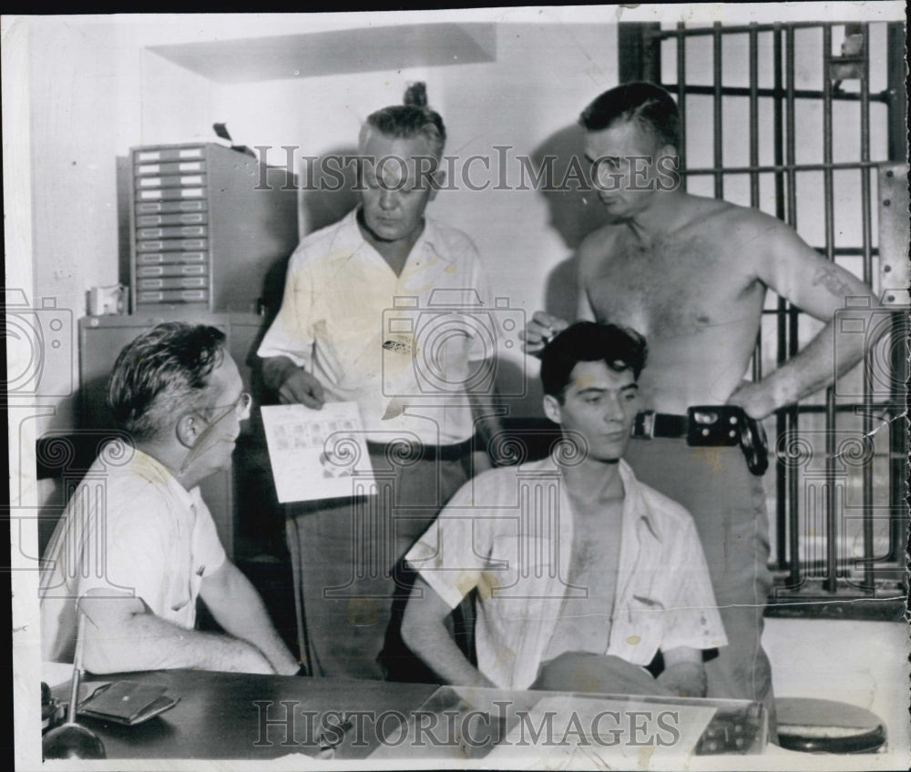 1952 Press Photo George A. Heroux, in Miami Sheriff&#39;s Office. - Historic Images