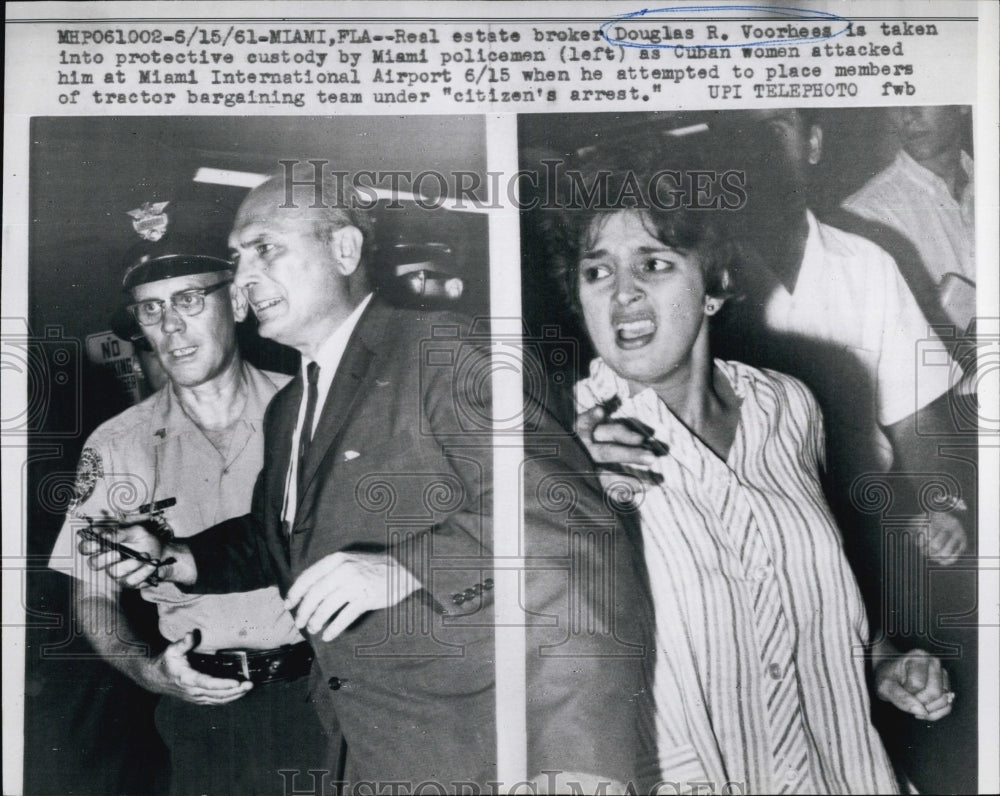 1961 Press Photo Real Estate Broker Douglas Voorhees as Cuban woman attacked him - Historic Images