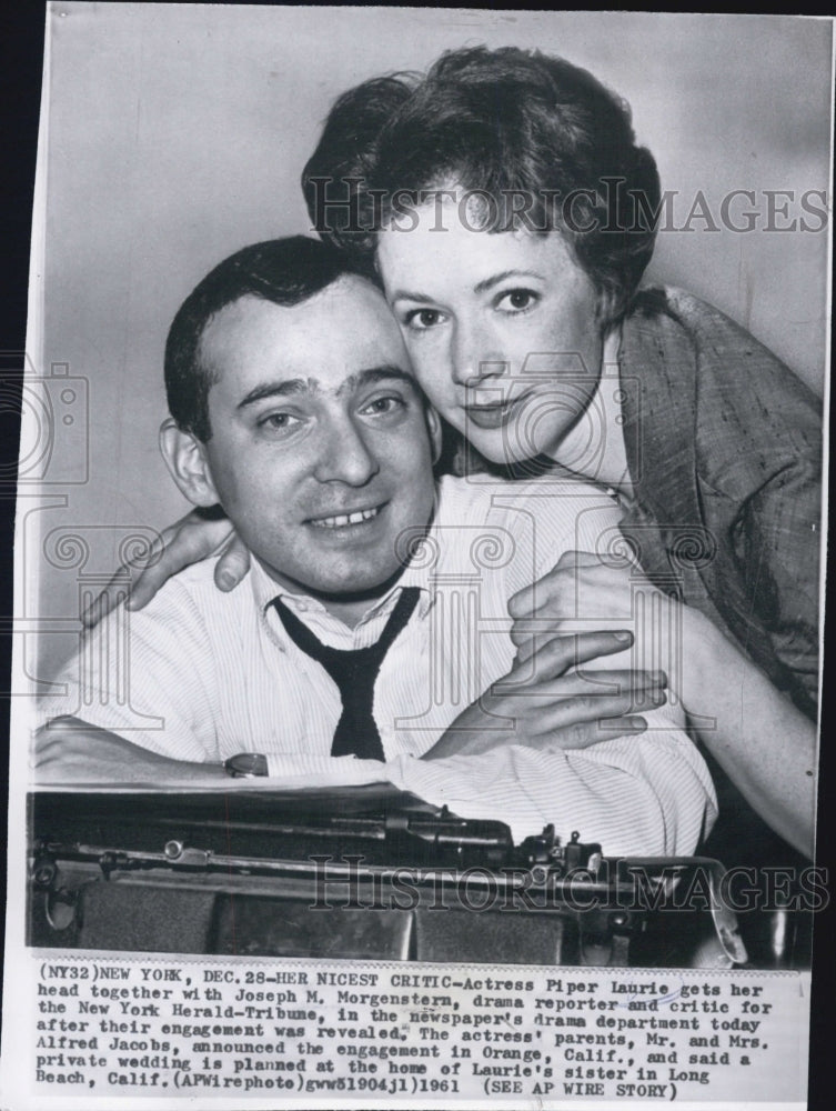 1961 Actress Piper Laurie with drama reporter Joseph Morgenstern. - Historic Images