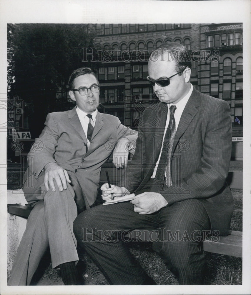 1965 Press Photo Mayor Charles V. Ryan interviewed by reporter Bruce McCabe. - Historic Images