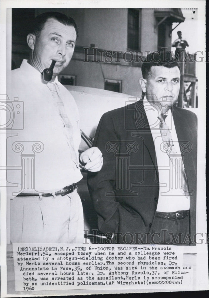 1960 Press Photo Dr Francis Merlo and unnamed policeman - Historic Images