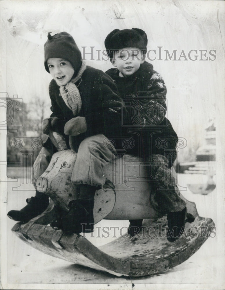 1955 Press Photo Two Youngsters Playing on A rocking Pig In Leningrad Playground - Historic Images