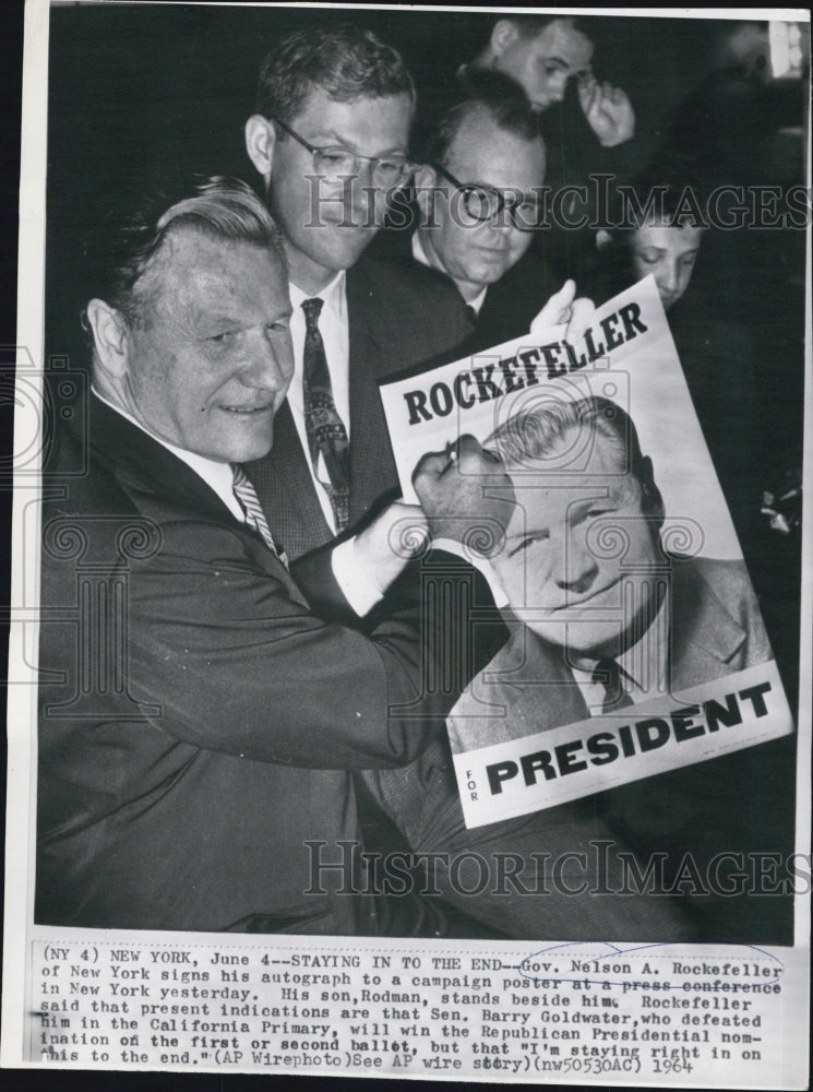 1964 Press Photo Governor Nelson Rockefeller New York Signs Campaign Poster - Historic Images