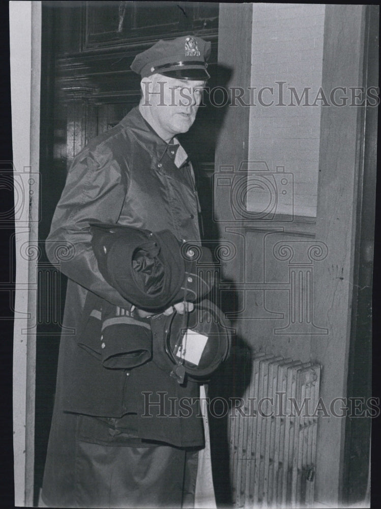 1974 Press Photo Patrolman Edward Cavanaugh Leaving School With Hat & Coat - Historic Images