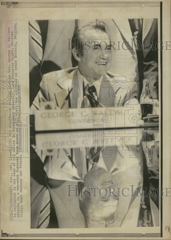 1975 Press Photo Ala Gov George Wallace prepares for European trip - Historic Images