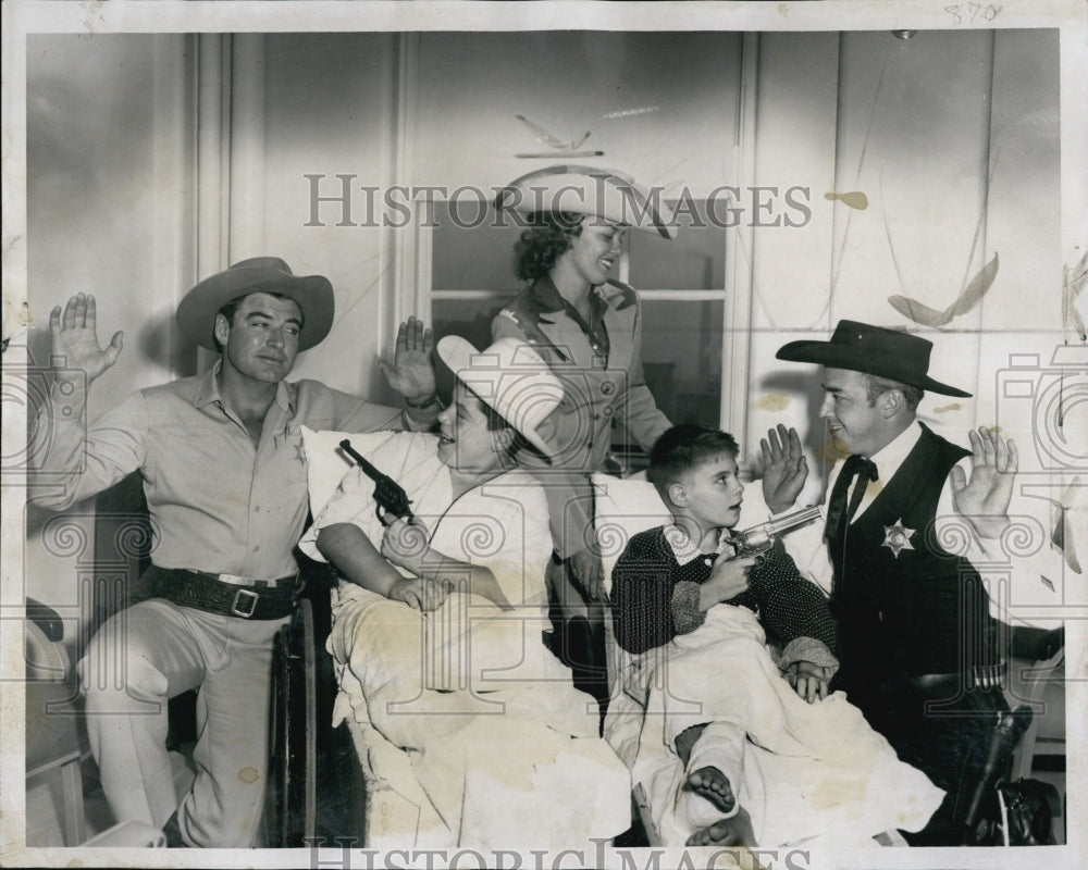 1958 Press Photo Rodeo members entertain kids Children&#39;s Medical Center - Historic Images