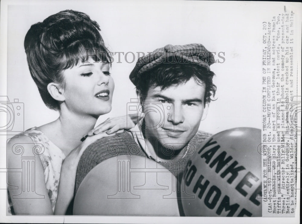 1961 Press Photo Horst Buchols And Pamela Tiffin With Props From One,Two, Three - Historic Images