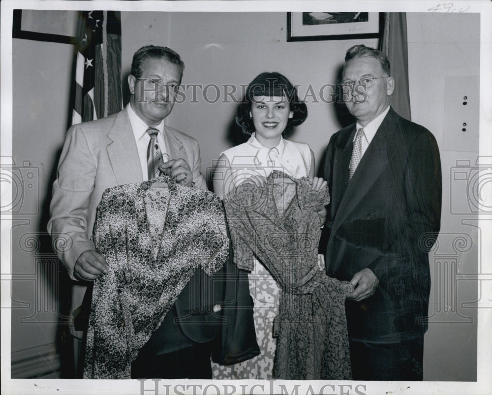 1952 Press Photo Mayor Hynes inspects garmetns Clothes for Korsa Campaign - Historic Images