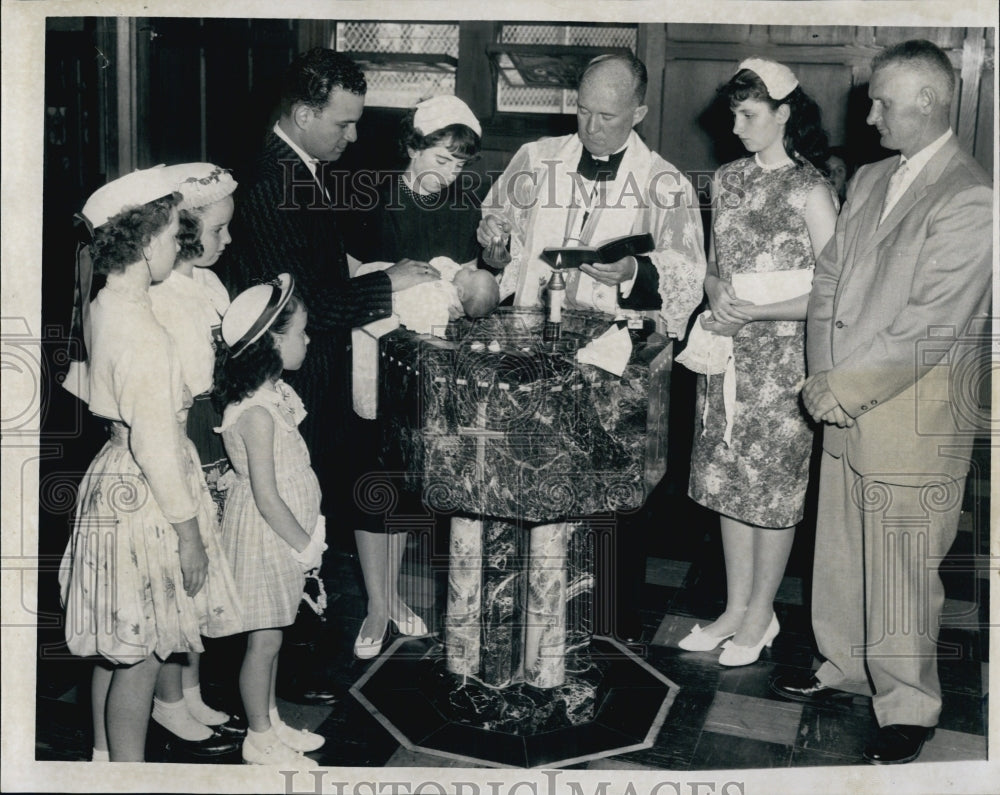 1960 Press Photo Reverend Francis Finnigan Christens Baby - Historic Images