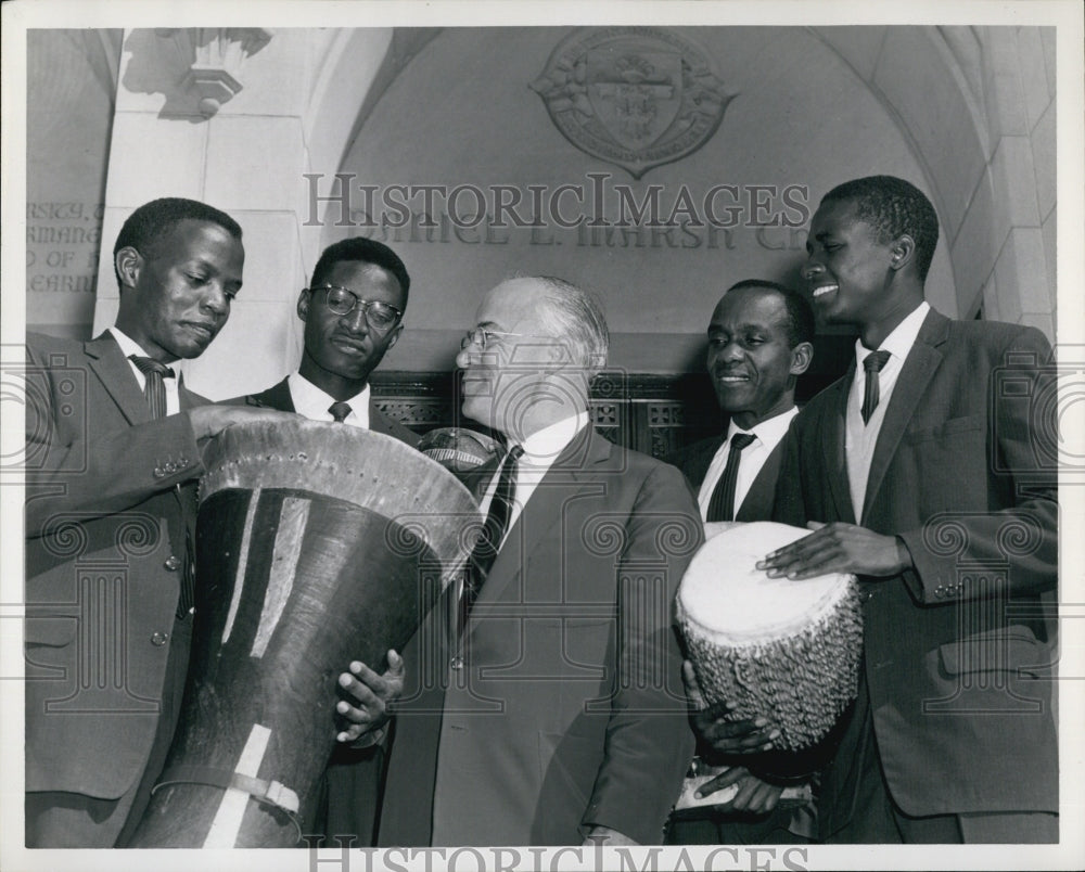 1959 African Singers explaining the techniques of Native Drumming. - Historic Images