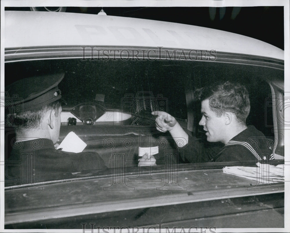 1956 Press Photo Seaman F/C John Elbert Lafferty with police officer. - Historic Images