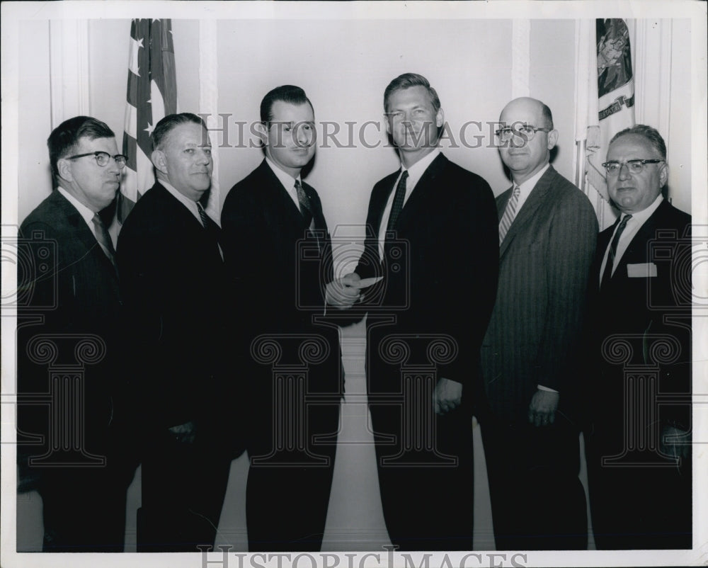 1963 Press Photo Gov. Peabody accepts bid from Automotive Lodge. - Historic Images